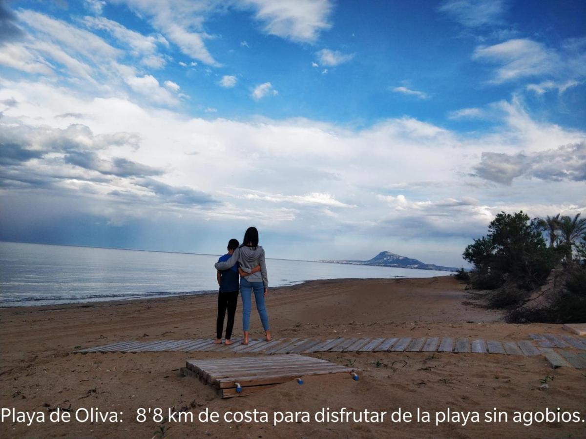 Bungalow Parte Baja Oliva Bagian luar foto